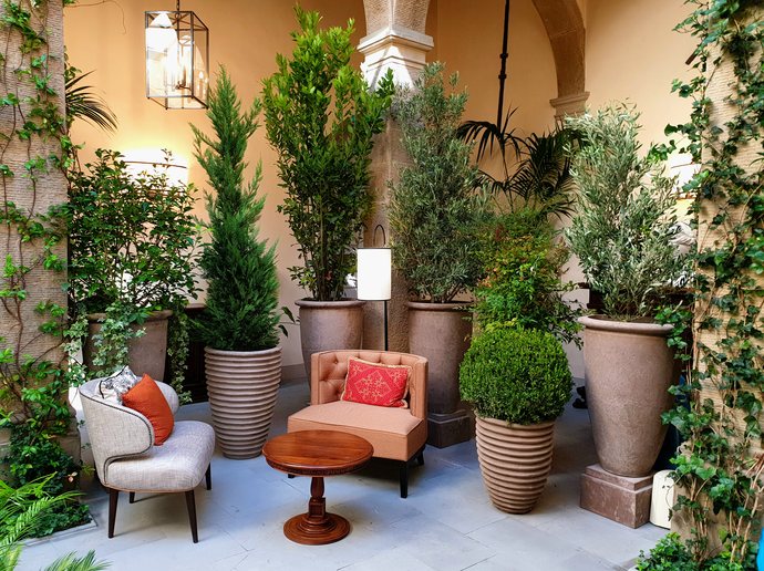 Orangerie at Villa San Michele, Florence - planted seating area